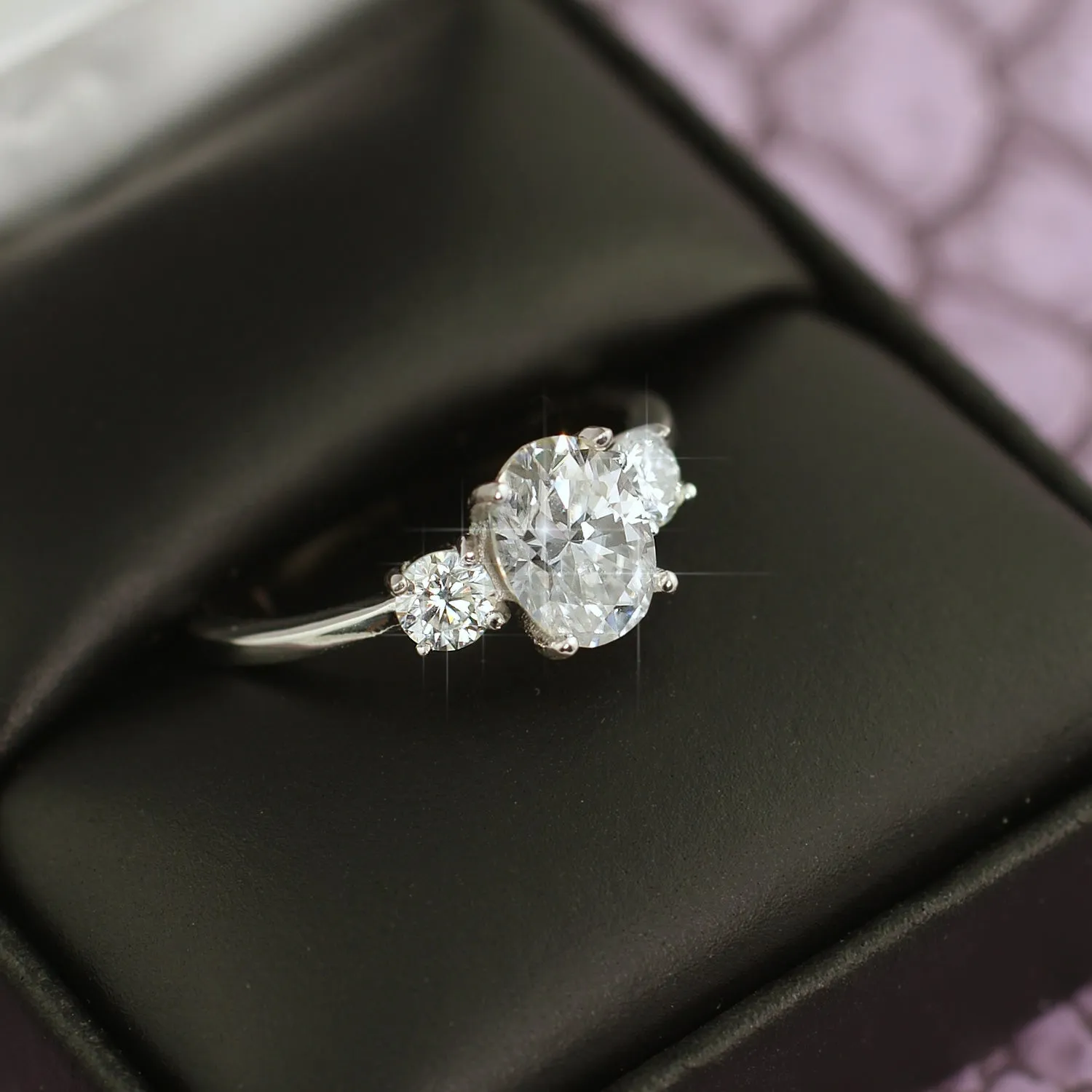 1.9 CTW Oval 3 Stone VVS1 Moissanite Engagement Ring