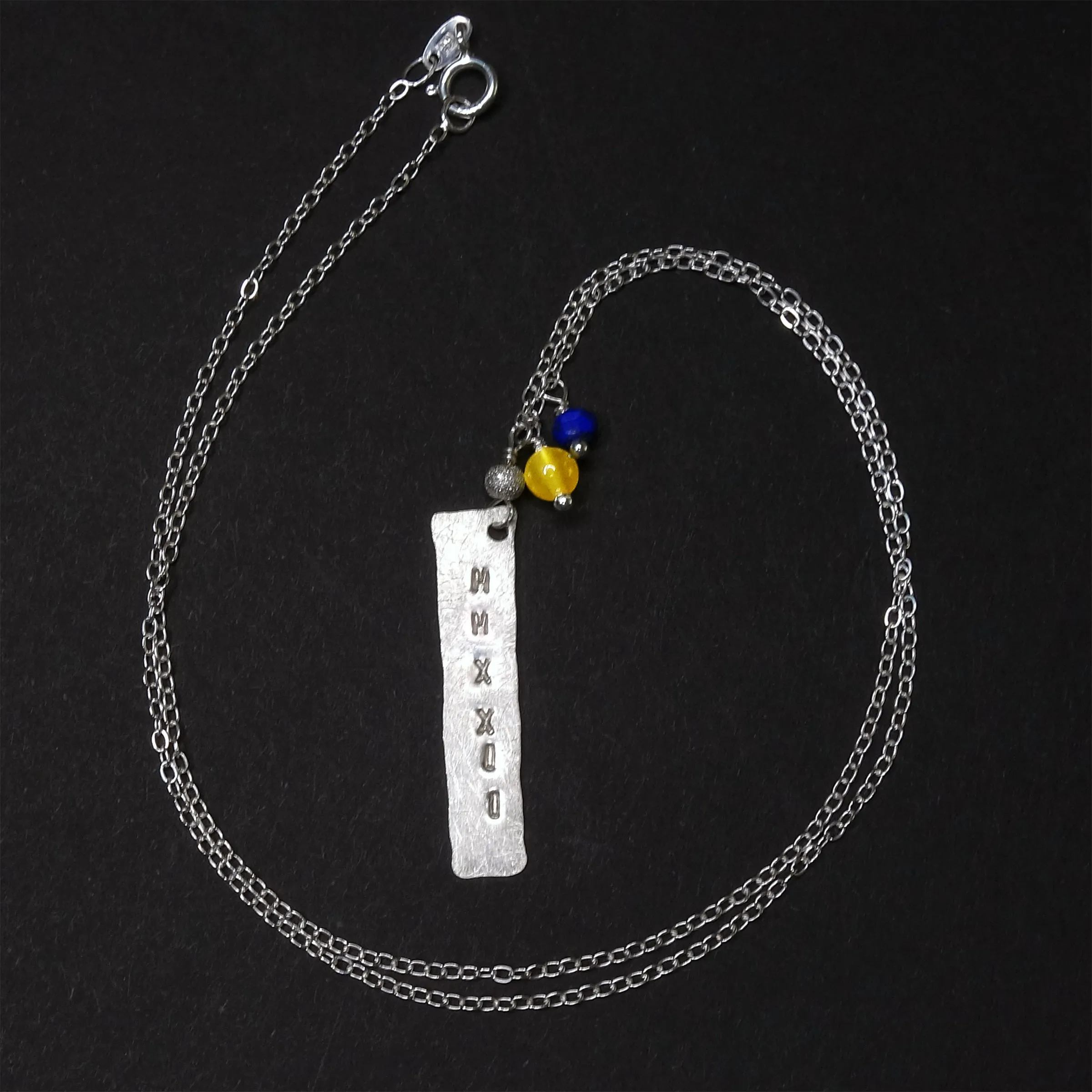 Hammered gold/silver MMXXII pendant with school colors