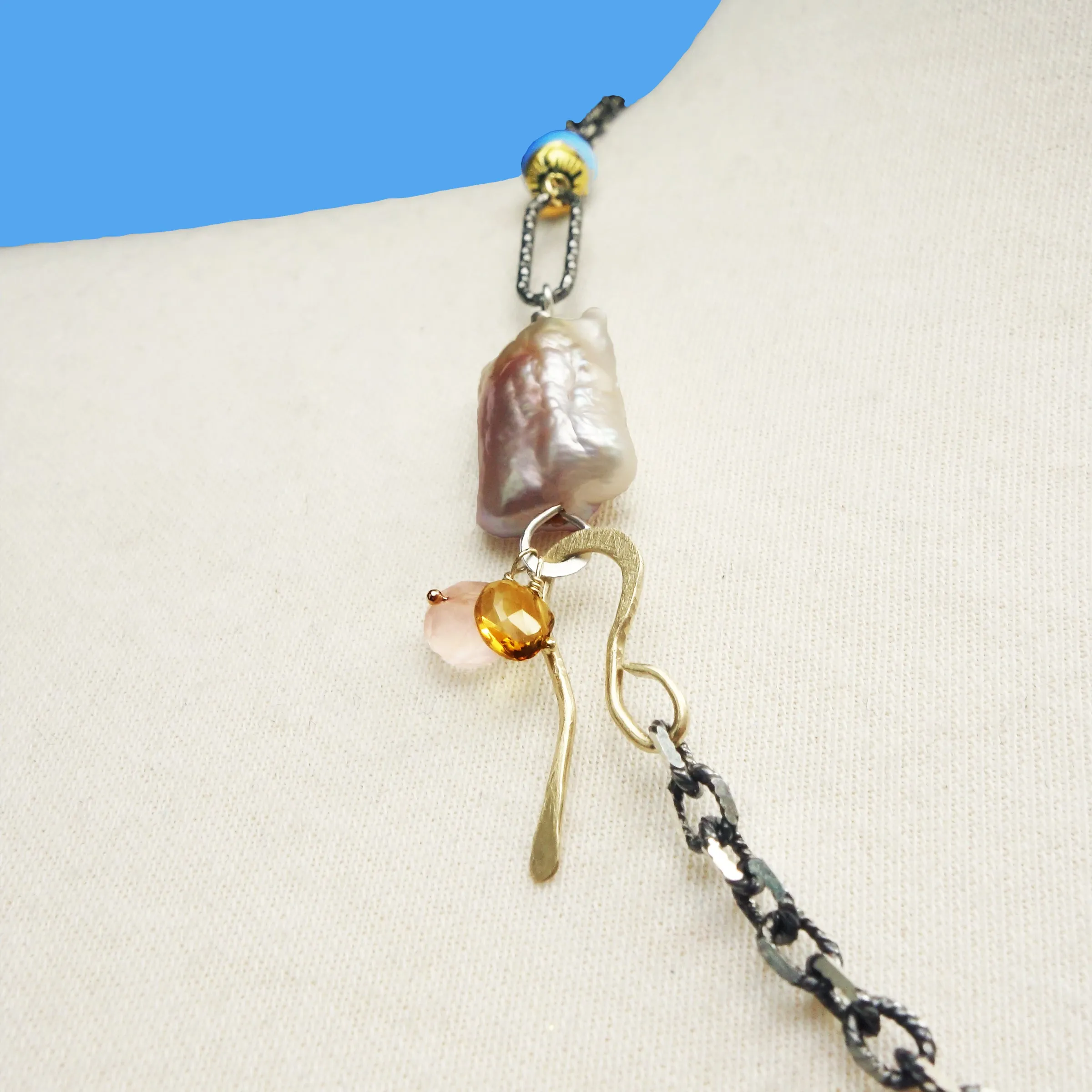 Her Blush Spoke a Thousand Words: pink mabe pearl, silver   gold necklace