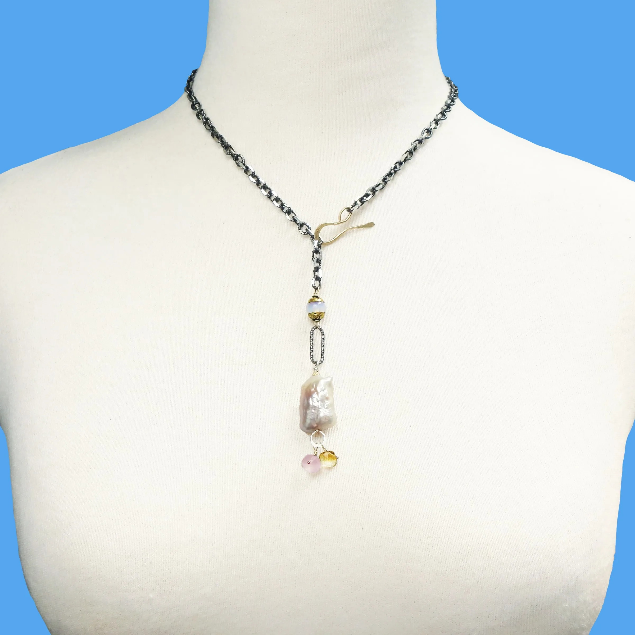 Her Blush Spoke a Thousand Words: pink mabe pearl, silver   gold necklace