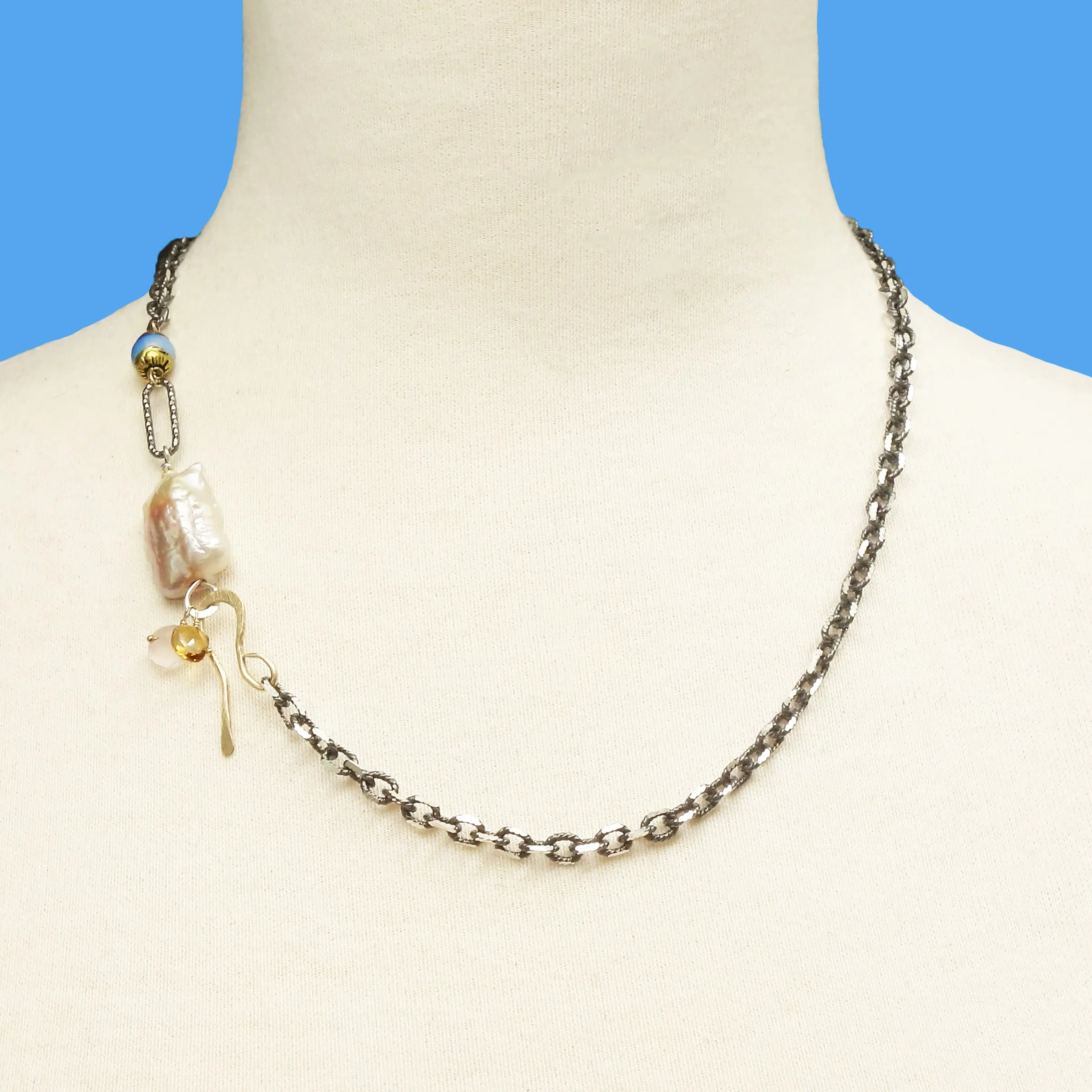 Her Blush Spoke a Thousand Words: pink mabe pearl, silver   gold necklace