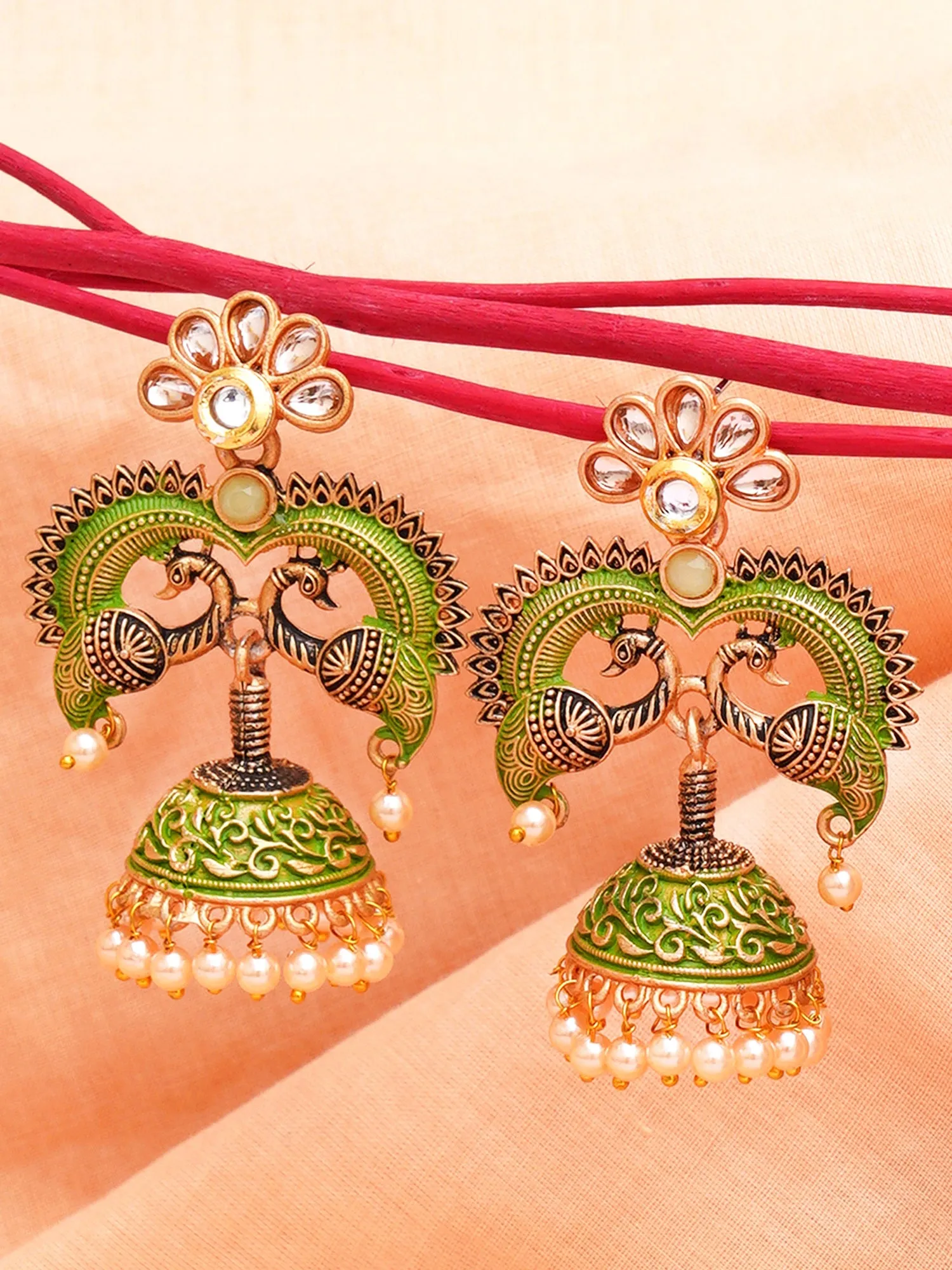 Karatcart Antique Gold Plated Light Green Designer Peacock Jhumki Earrings for Women