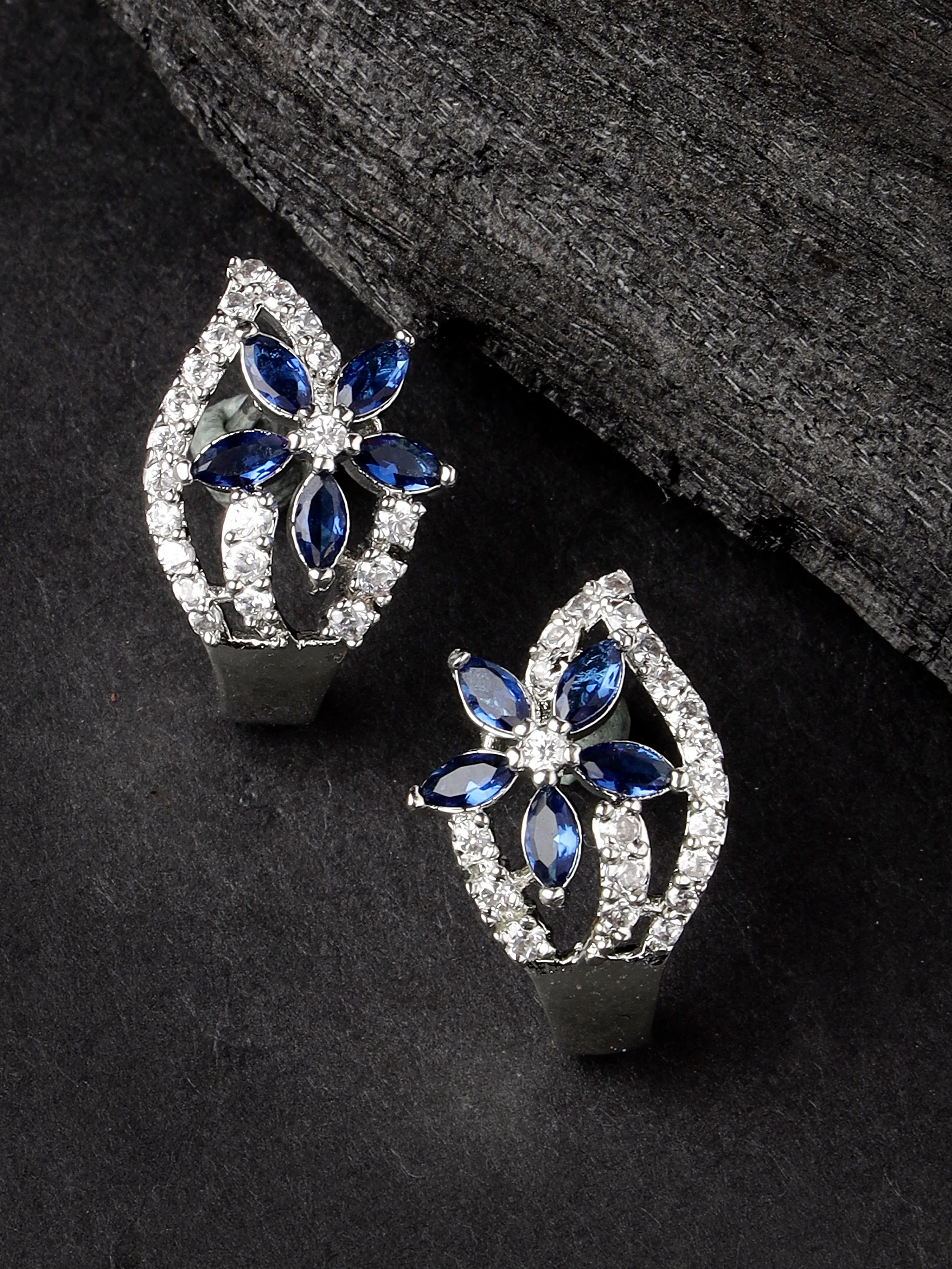 Karatcart Blue Stones Silver Plated Floral Design AD Stud Earrings for Women
