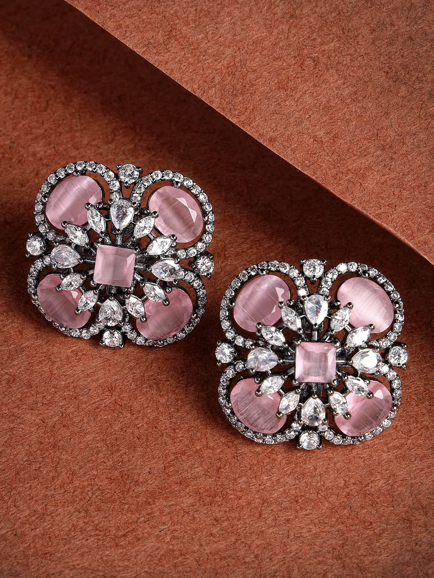 Karatcart Floral Design Pink Cubic Zirconia Studded Black Silver Plated Stud Earrings for Women