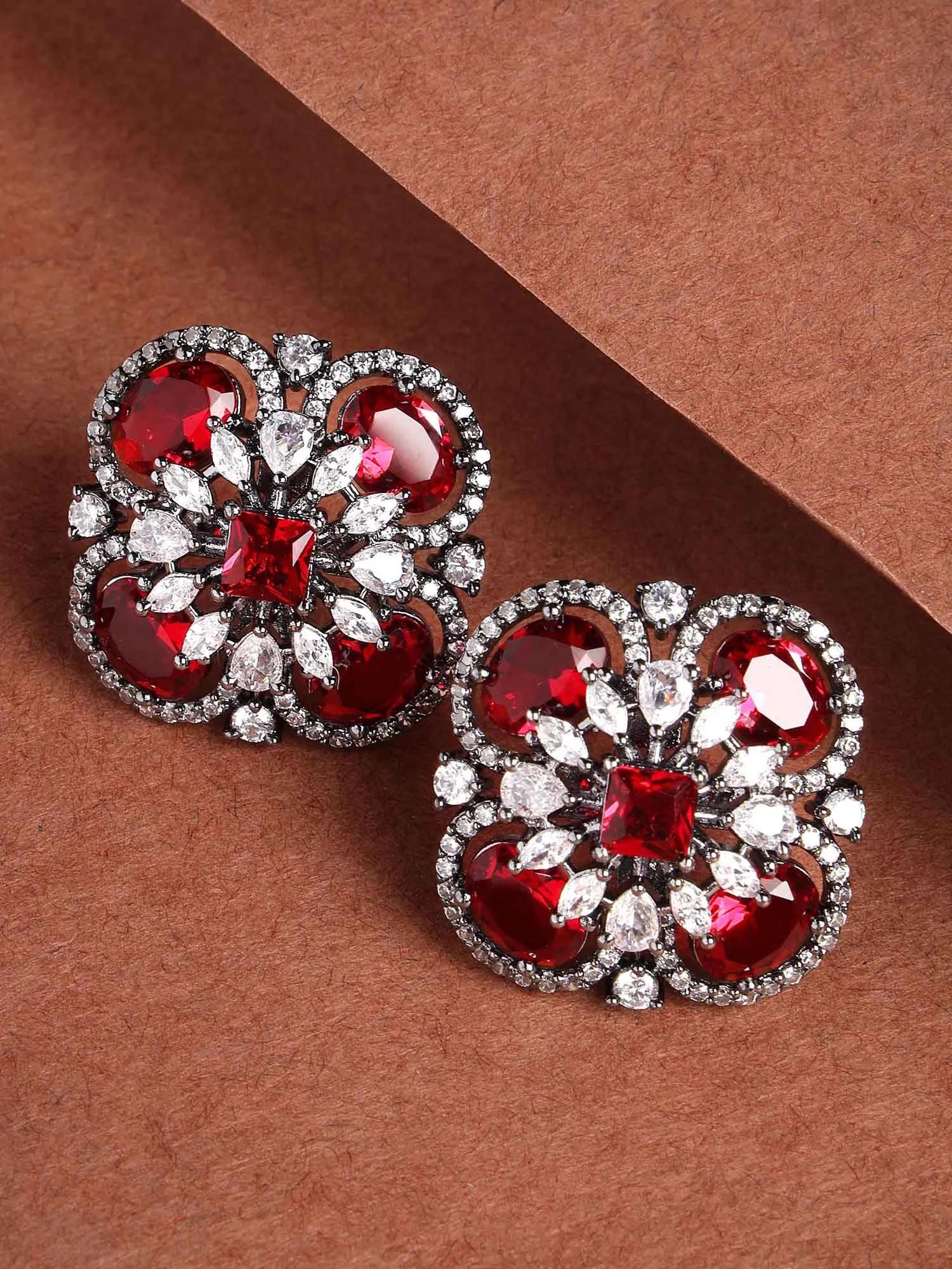 Karatcart Floral Design Red Cubic Zirconia Studded Black Silver Plated Stud Earrings for Women