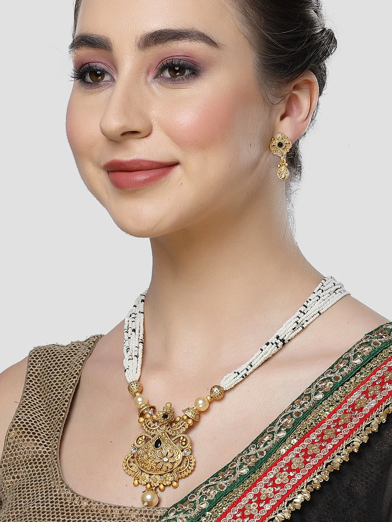 Karatcart Gold Plated Black Stone Studded Beaded Ranihaar Necklace Set for Women