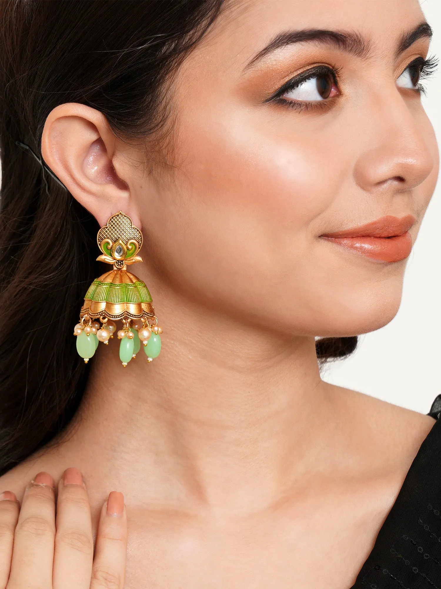 Karatcart Gold Plated Light Green Tumble and Golden Pearl Studded Jhumki Earrings for Women