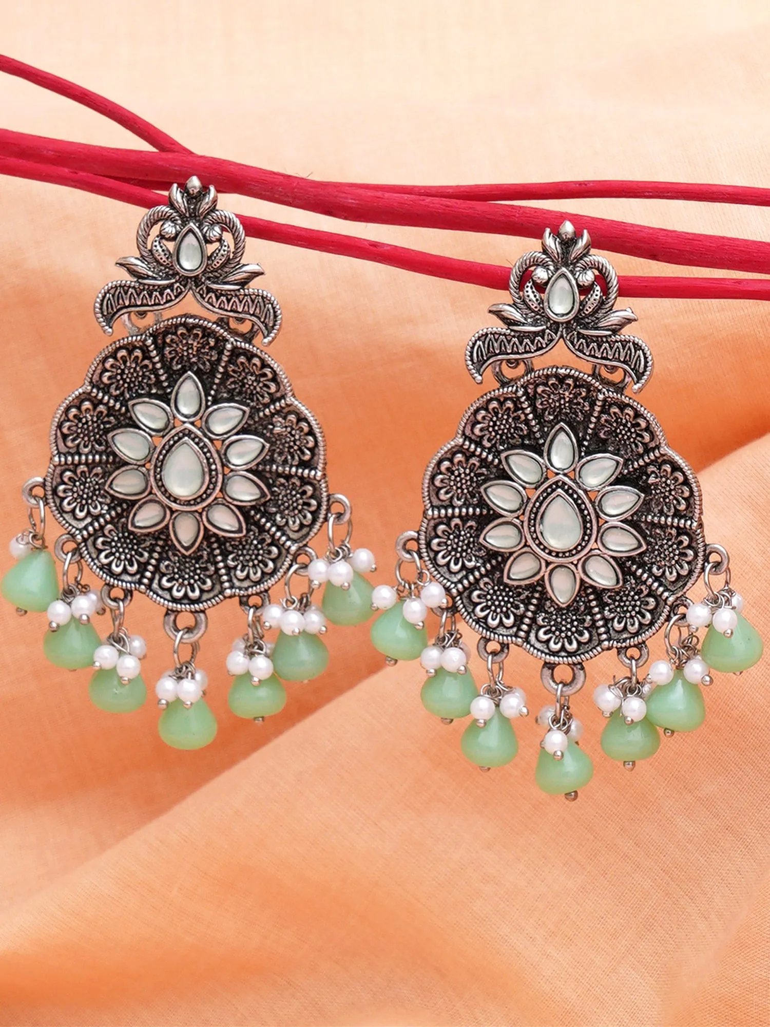 Karatcart Oxidised Silver Light Green Monalisa Stone Studded Floral Dangler Earrings for Women