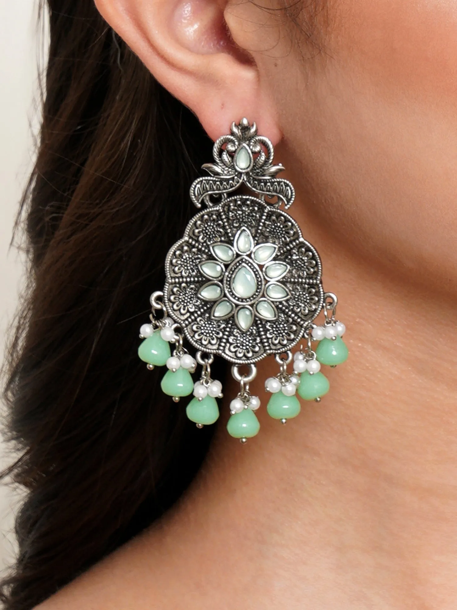 Karatcart Oxidised Silver Light Green Monalisa Stone Studded Floral Dangler Earrings for Women