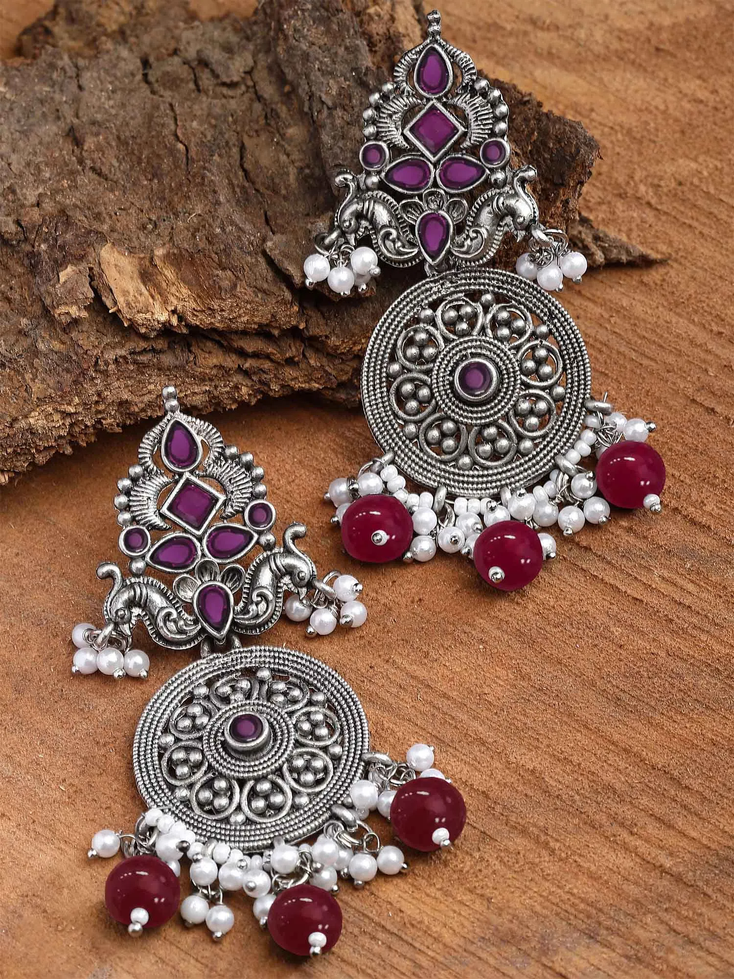 Karatcart Oxidised Silver Red Stone Chakra Design Dangler Earrings for Women