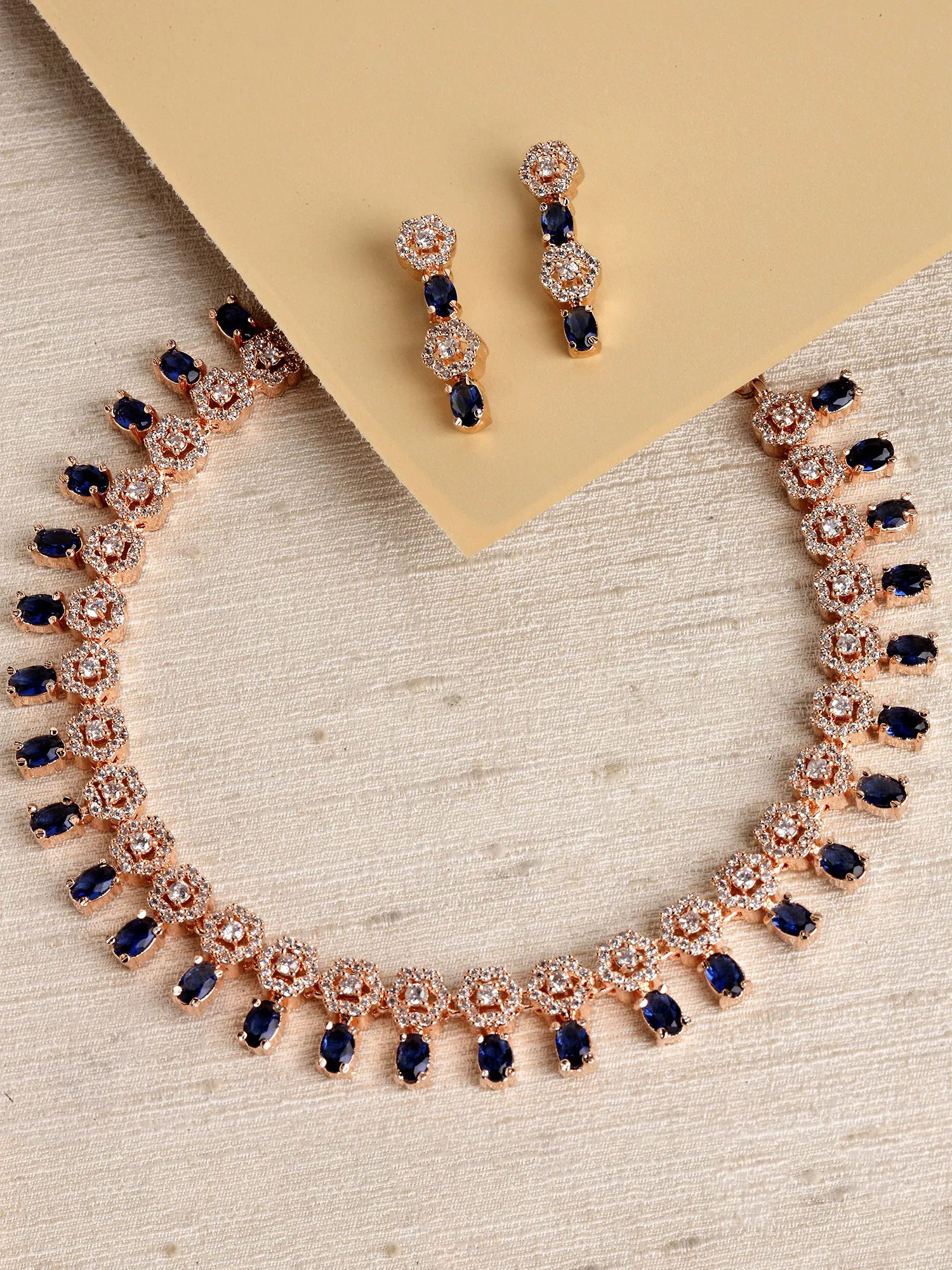 Karatcart Rose Gold Plated Floral Design Blue Cubic Zirconia Studded Necklace Set
