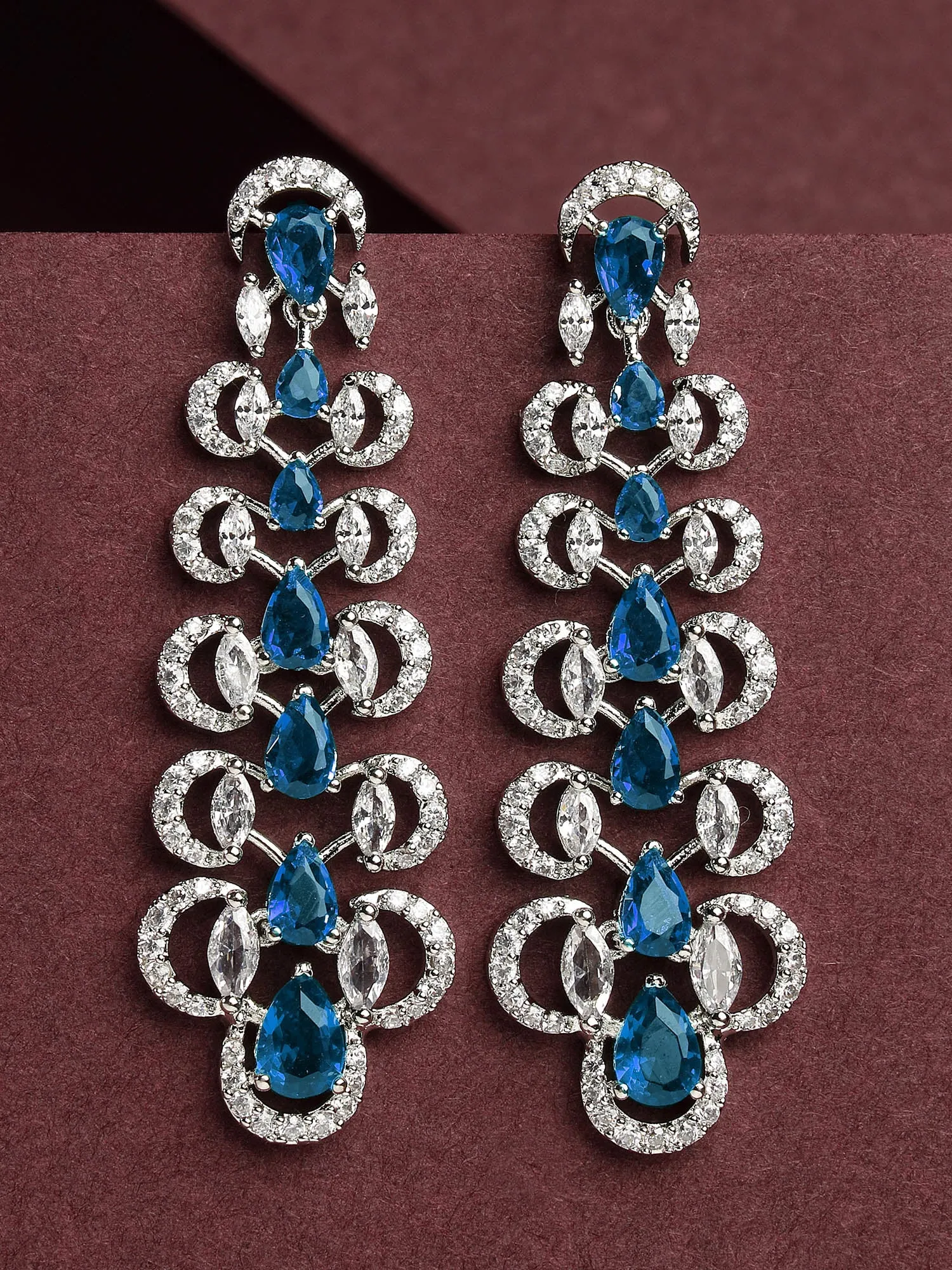 Karatcart Silver Plated Blue Cubic Zirconia Studded Leaf Design Drop Earrings for Women