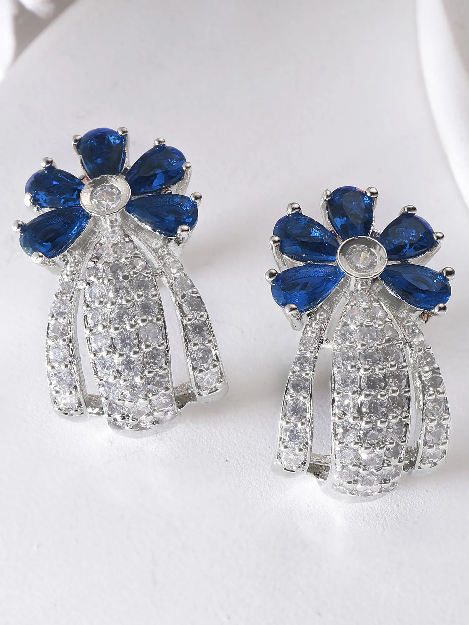 Karatcart Silver Plated Blue Stones Floral Design AD Stud Earrings for Women