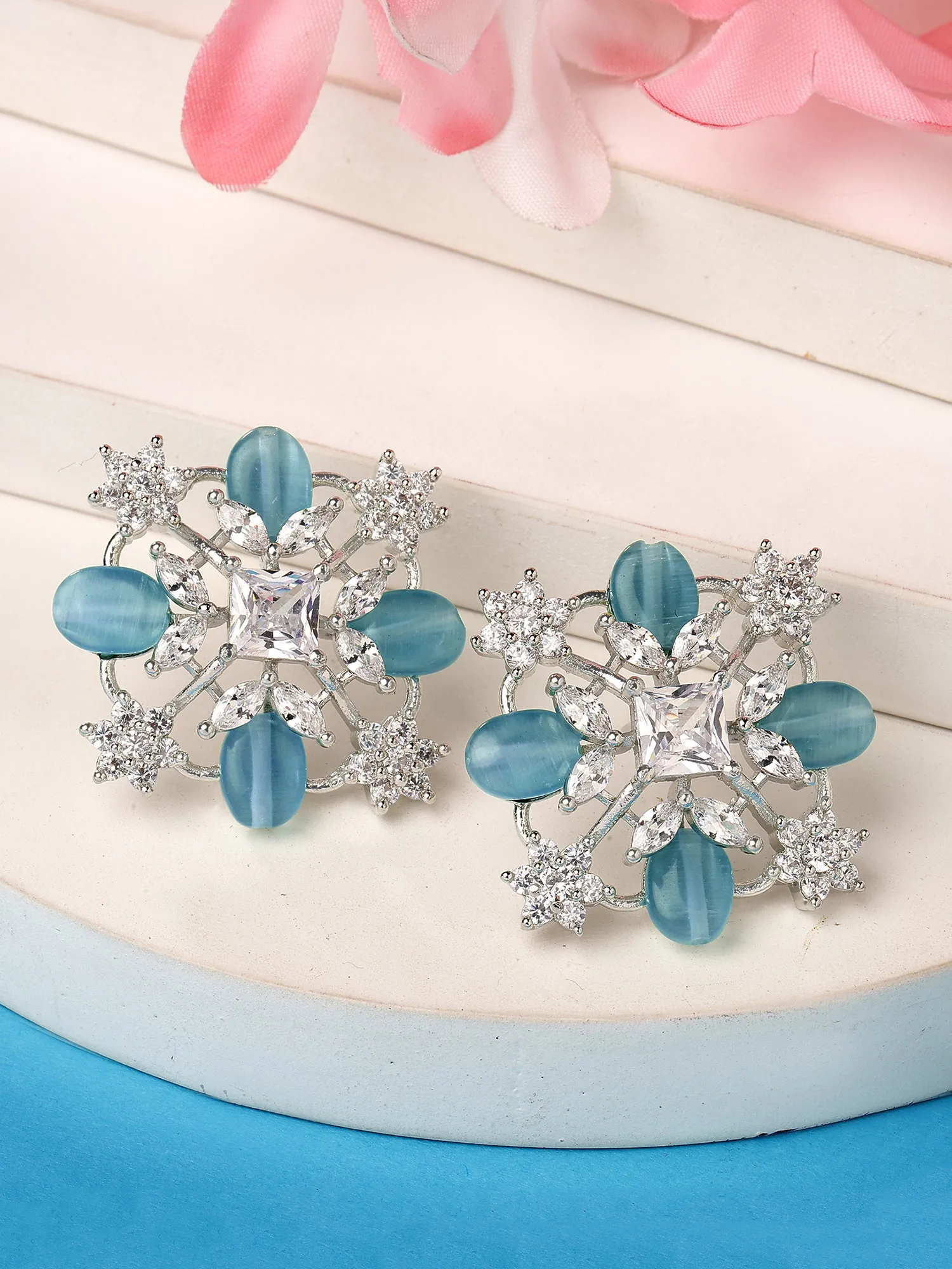 Karatcart Silver Plated Light Blue Stones AD Stud Earrings for Women