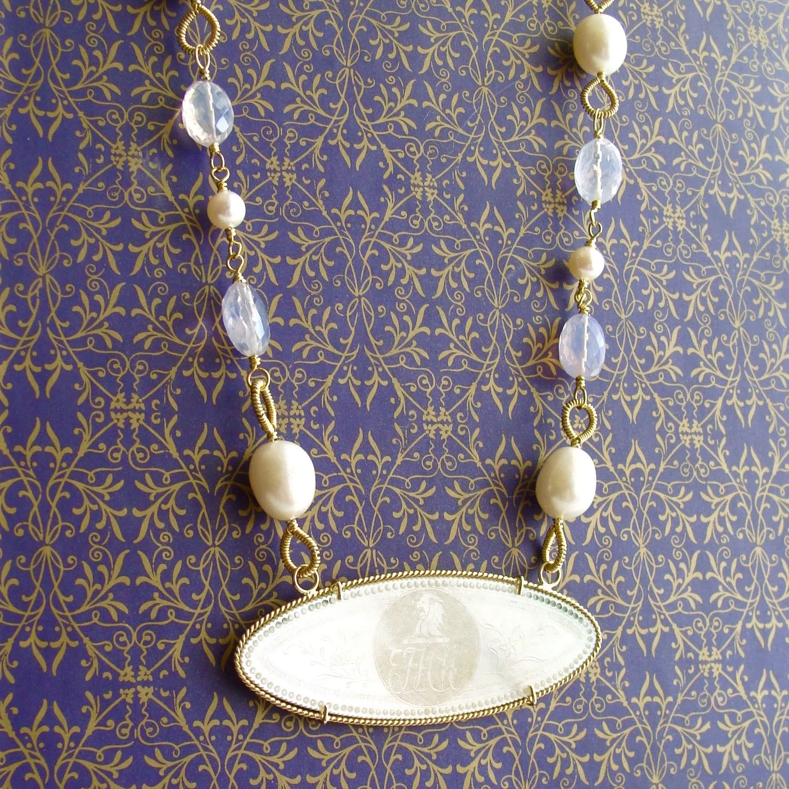 MOP Lion Head Armorial Monogram Gaming Counter Necklace Lavender Moon Quartz - La Finesse Armorial Monogram Necklace