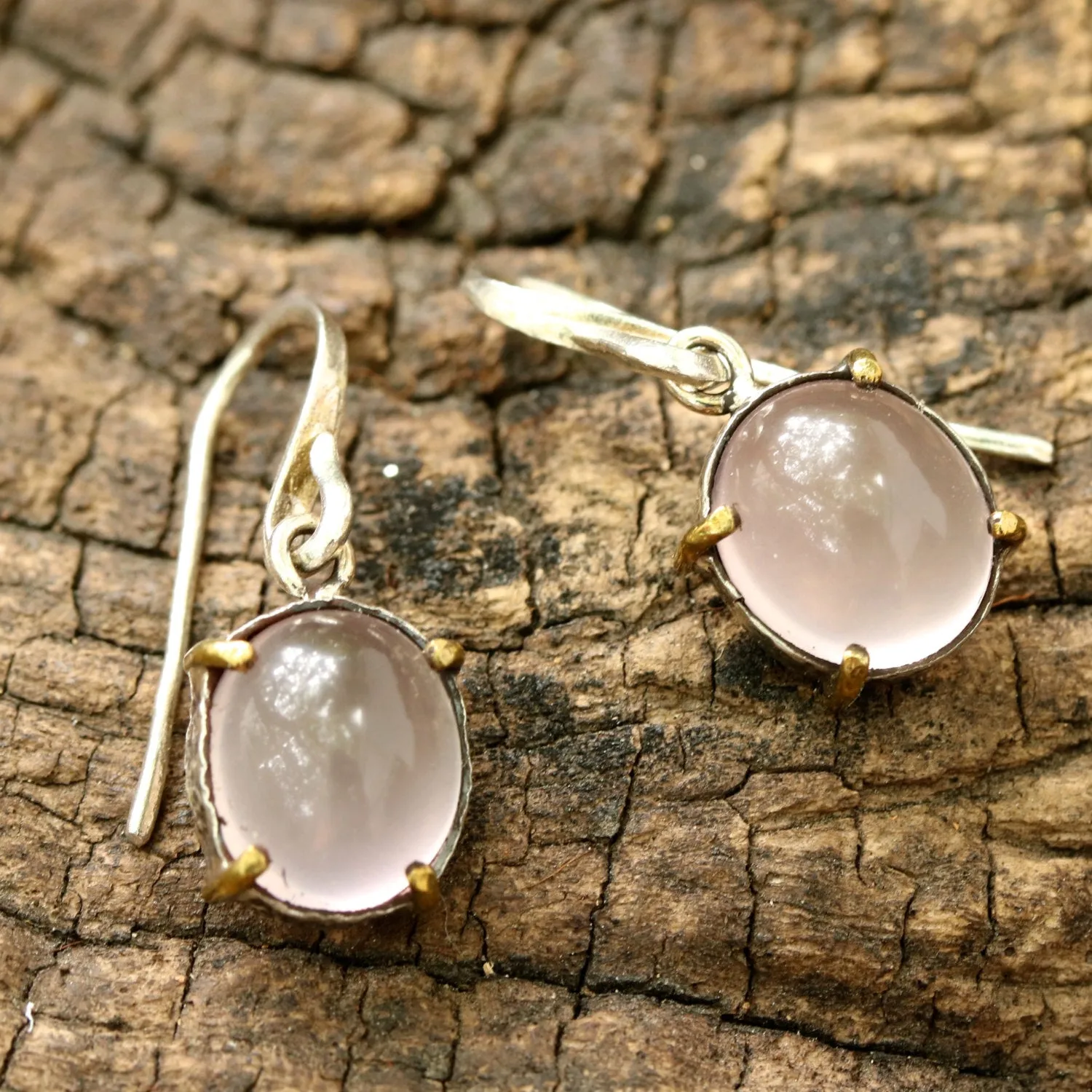 Oval cabochon Rose quartz earrings in silver bezel setting with polished brass accent prongs
