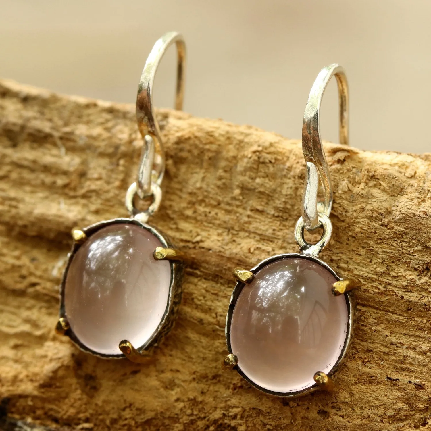 Oval cabochon Rose quartz earrings in silver bezel setting with polished brass accent prongs